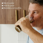 Man drinking a prepared glass of Natural Health by Meah Man21