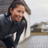 Woman pausing after exercise in official Melrose FutureLab Inflammation Modulator lifestyle imagery