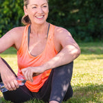 Smiling active woman outdoors in official Melrose FutureLab Menopause Ultra Complex lifestyle imagery