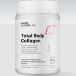 Large white Melrose FutureLab Total Body Collagen jar standing on a pale reflective surface, with a ribbed lid and pink DNA-helix graphic beside black lettering.