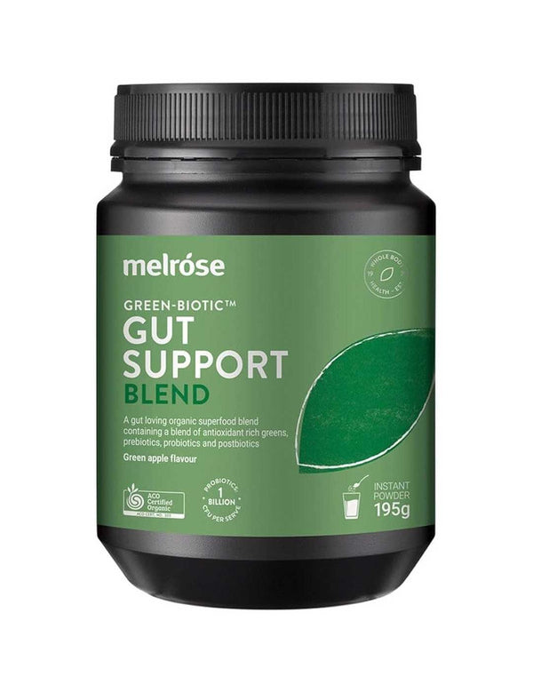A black jar of Melrose Green-Biotic Gut Support Certified Organic Blend 195g, green apple flavor, features a green label. This probiotic supplement contains prebiotics, probiotics, and postbiotics for optimal gut health.
