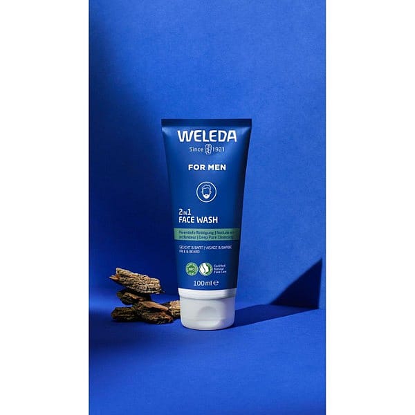 Weleda Men 2 in 1 Face Wash with willow bark on a blue background