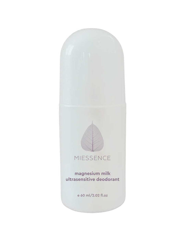 White Miessence Magnesium Milk deodorant bottle with a tall rounded cap, a pale lavender leaf emblem and small purple Ultrasensitive Deodorant lettering.