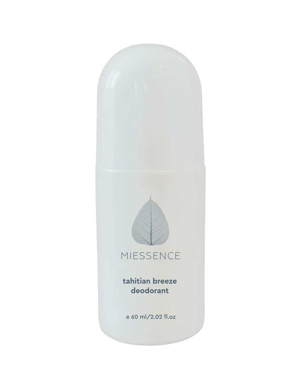 White Miessence Tahitian Breeze roll-on deodorant bottle with a tall rounded cap, a pale blue-grey leaf emblem and small blue-grey lettering.