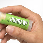 Hand holding Hurraw! Organic Lip Balm - Mint 4.8g