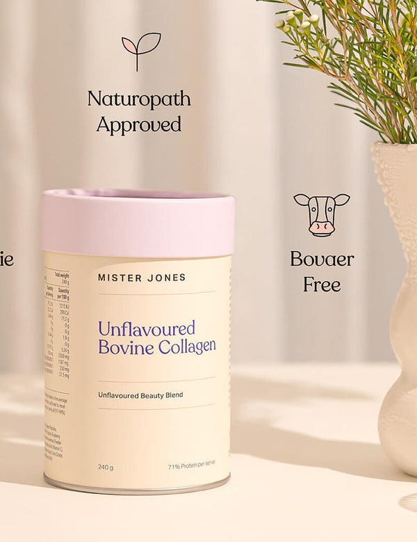 Cream Mister Jones Unflavoured Bovine Collagen canister with a lilac lid beside a vase of foliage, with Naturopath Approved and Bovaer Free captions.