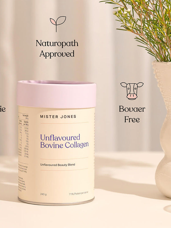 Cream Mister Jones Unflavoured Bovine Collagen canister with a lilac lid beside a vase of foliage, with Naturopath Approved and Bovaer Free captions.