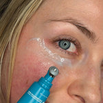 MooGoo 3-in-1 Peptide Eye Serum cooling applicator in use