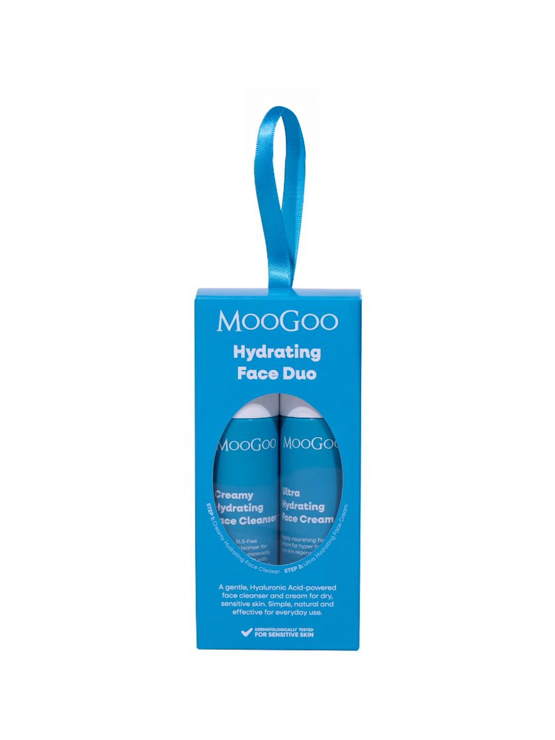 MooGoo Hydrating Face Duo in a blue gift box with a satin hanging loop. The oval window reveals Creamy Hydrating Face Cleanser and Ultra Hydrating Face Cream.