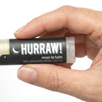 Hand holding Hurraw! Moon Lip Balm Blue Chamomile & Vanilla 4.8g
