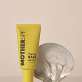 MOTHER SPF Tinted Base styled with a pearl shell