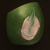 MOTHER SPF Tinted Base texture styled on avocado
