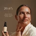Woman holding Mukti Bioactive Renewal Day Serum with the official clinical wrinkle-volume result.