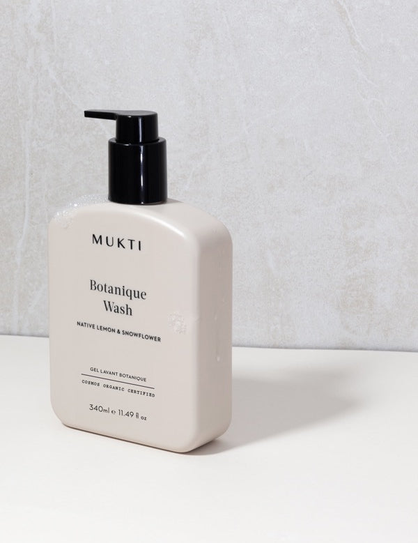Mukti Botanique Body Wash in a clean bathroom setting