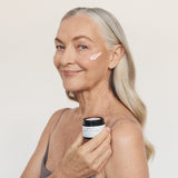 Woman holding Mukti Queen of the Night Creme