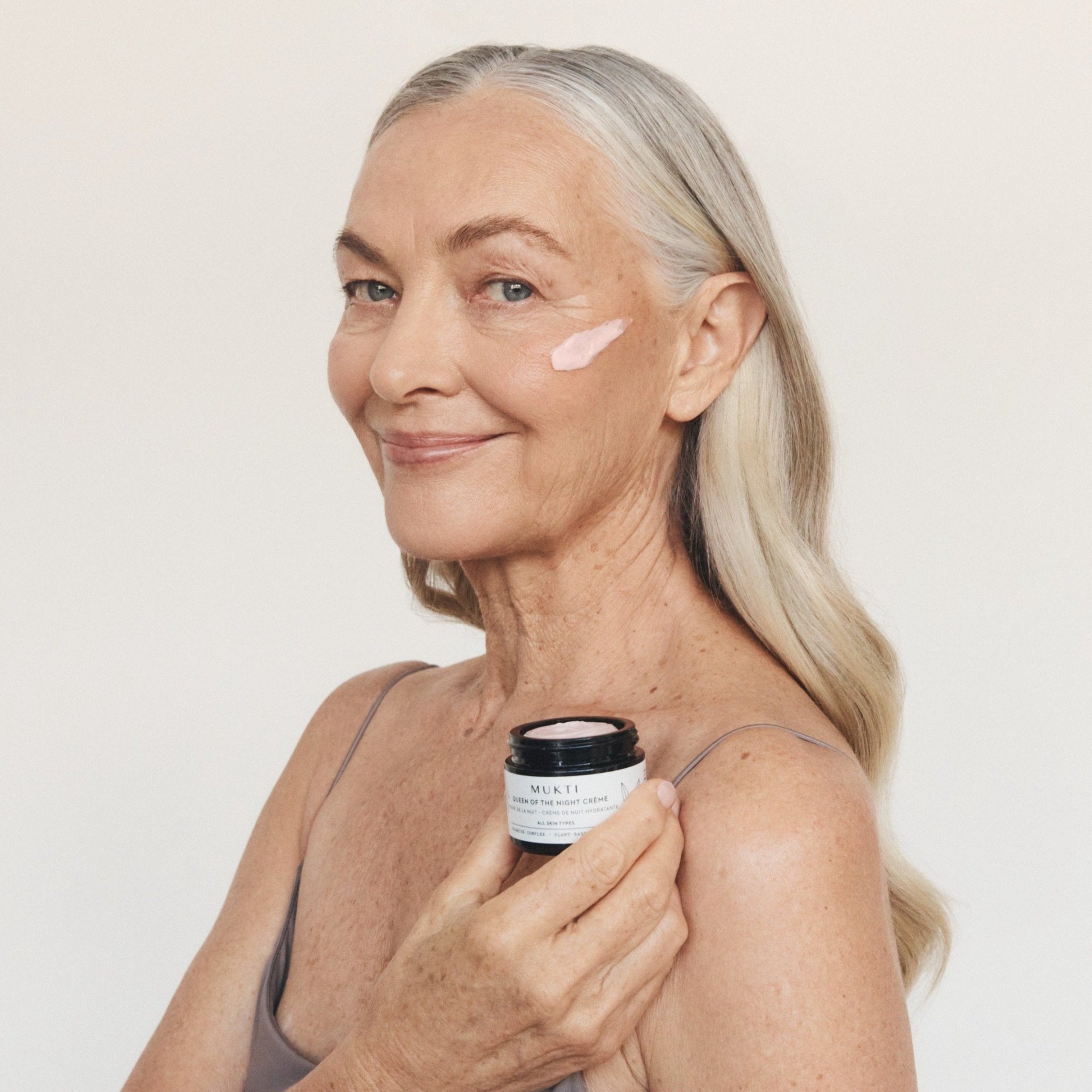Woman holding Mukti Queen of the Night Creme