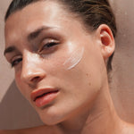 Woman wearing Mukti Restorative Moisturiser