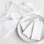 Vanessa Megan organic muslin face cloths folded in a bowl