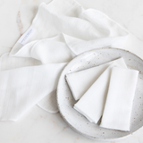Vanessa Megan organic muslin face cloths folded in a bowl