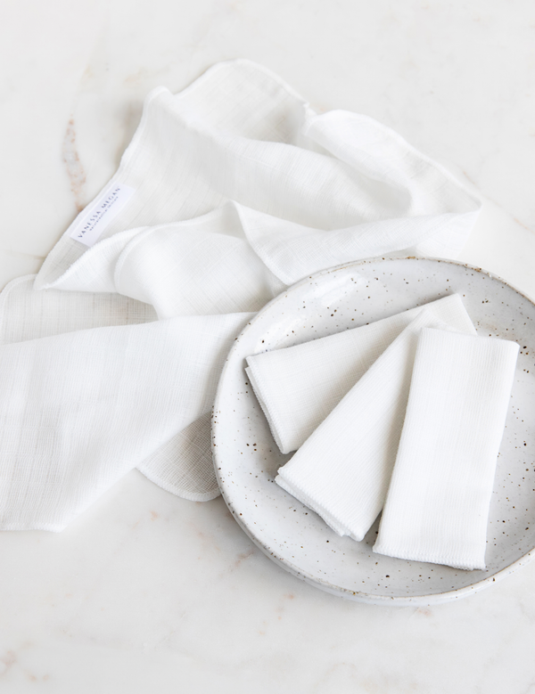 Vanessa Megan organic muslin face cloths folded in a bowl