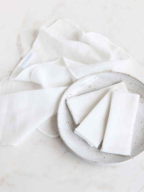 Vanessa Megan organic muslin face cloths folded in a bowl