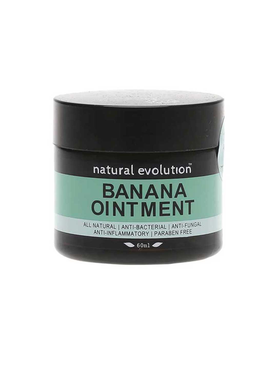 A black jar labeled Natural Evolution Banana Ointment 60g offers natural skincare benefits from green bananas. It is all-natural, anti-bacterial, anti-fungal, anti-inflammatory, paraben-free, and contains 60g of product.