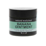 A black jar labeled Natural Evolution Banana Ointment 60g offers natural skincare benefits from green bananas. It is all-natural, anti-bacterial, anti-fungal, anti-inflammatory, paraben-free, and contains 60g of product.