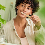 Brushing teeth with Weleda Ratanhia Toothpaste