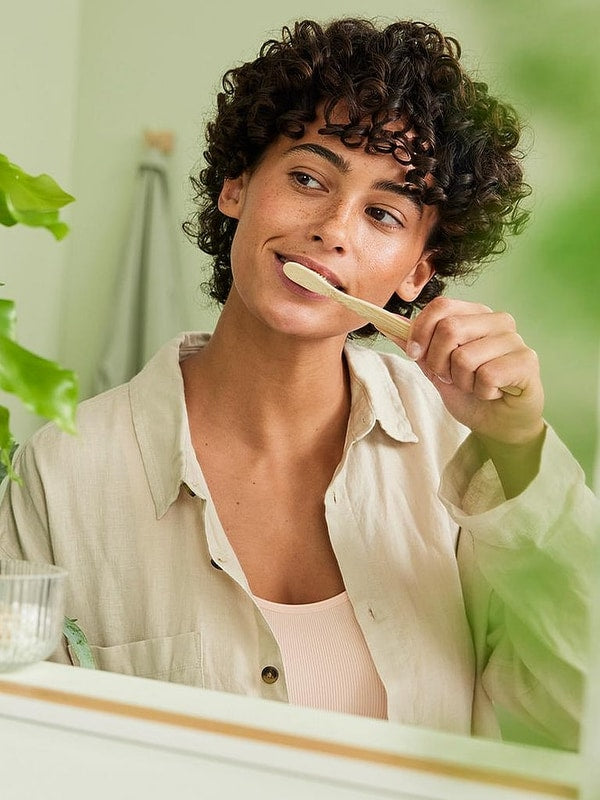 Brushing teeth with Weleda Ratanhia Toothpaste
