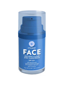 A blue cylindrical bottle of Little Urchin Natural Face Clear Zinc Sunscreen SPF50+ 50g for sensitive skin, featuring a pump dispenser, clear cap, and fragrance-free formula. White text on the label displays product details.