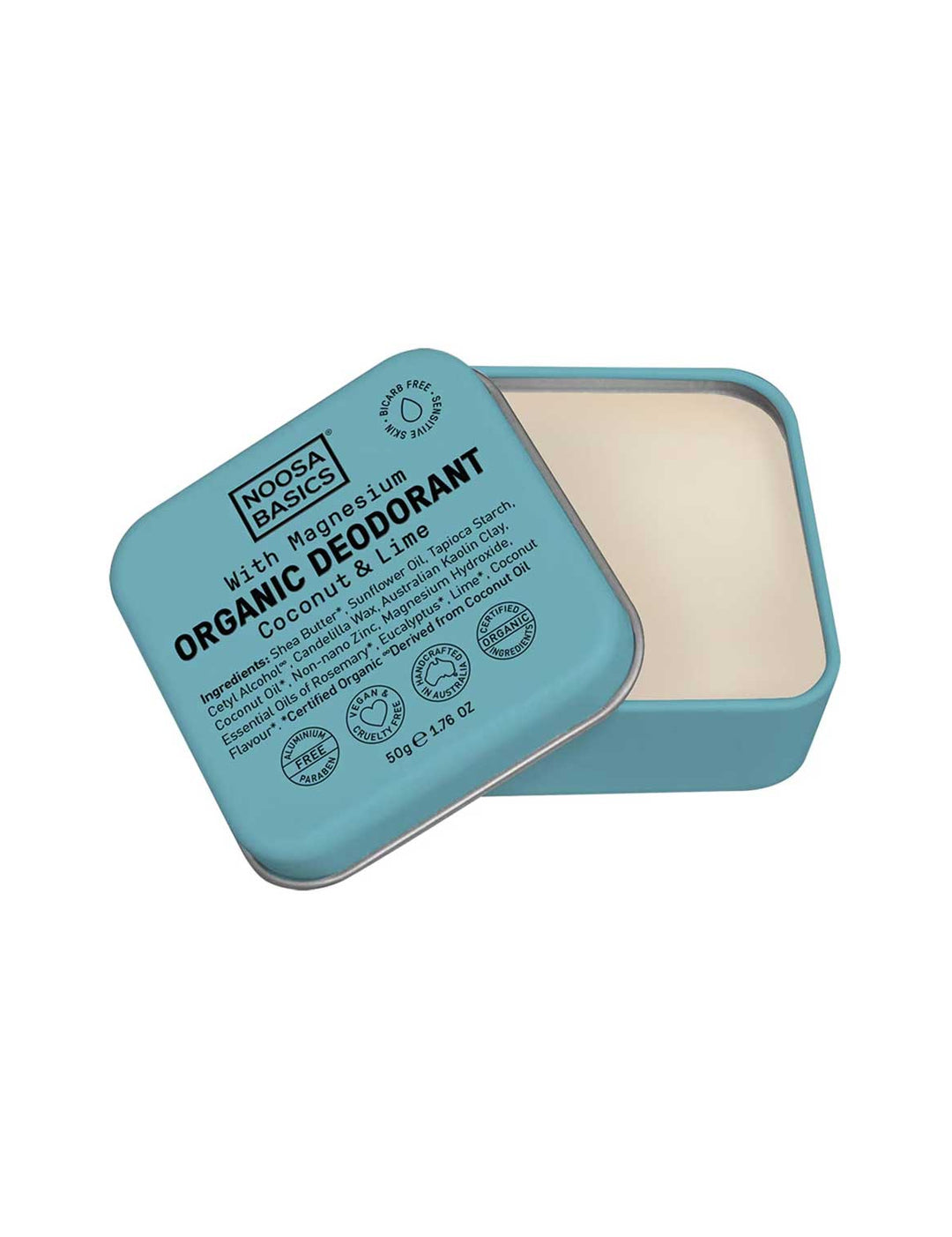 Open turquoise square Noosa Basics Coconut and Lime deodorant tin with rounded corners, showing smooth cream balm and its printed lid resting diagonally across the edge.