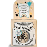 Kraft cardboard Oh Gigi Flavour-Free Toothpowder box with a white jar-shaped front panel and bold black lettering, topped by a tall tab featuring an outlined tooth and turquoise shield.