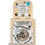 Kraft cardboard Oh Gigi Flavour-Free Toothpowder box with a white jar-shaped front panel and bold black lettering, topped by a tall tab featuring an outlined tooth and turquoise shield.