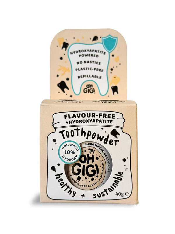 Kraft cardboard Oh Gigi Flavour-Free Toothpowder box with a white jar-shaped front panel and bold black lettering, topped by a tall tab featuring an outlined tooth and turquoise shield.