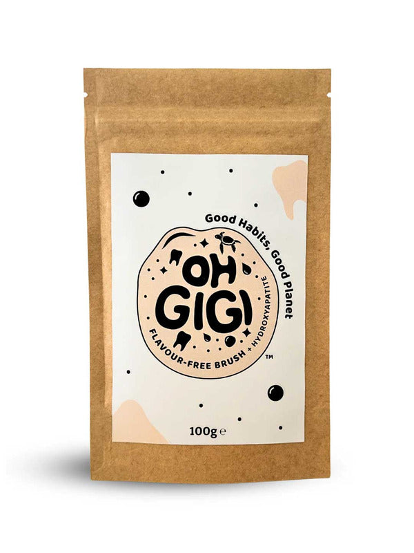 Brown resealable Oh Gigi Flavour-Free Toothpowder refill pouch with a large white label, bold black lettering inside a cream circle, and scattered black dots and pale peach shapes.