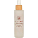 The Orgaid Balancing Niacinamide Toner 120ml comes in a clear frosted spray bottle with a wooden cap and floral logo, hydrating and balancing your skin with niacinamide for a refreshed feel.