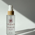 Orgaid Balancing Toner in soft window light