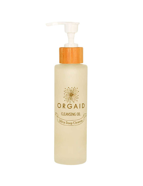 The Orgaid Cleansing Oil Ultra Deep Cleanse 120ml comes in a frosted pump bottle with a wooden-look cap and white pump, ideal for your skincare routine, displayed against a plain white background.