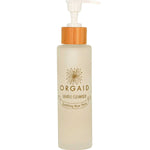 A clear frosted 120ml Orgaid Gentle Cleanser bottle with a pump and wooden accent, labeled "Soothing Aloe Vera," is ideal for sensitive skin and is displayed against a white background.