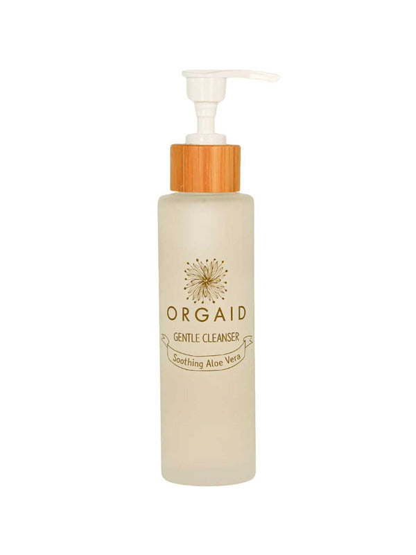 A clear frosted 120ml Orgaid Gentle Cleanser bottle with a pump and wooden accent, labeled "Soothing Aloe Vera," is ideal for sensitive skin and is displayed against a white background.