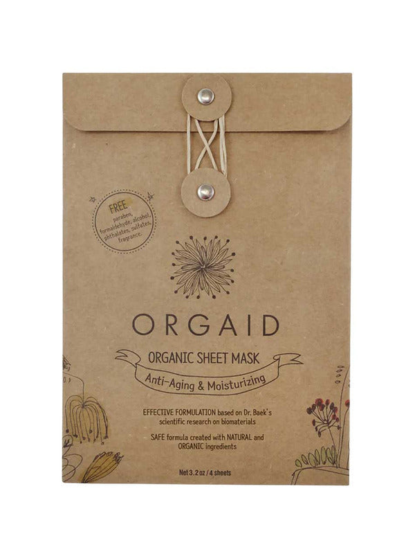 Kraft paper Orgaid Anti-Aging and Moisturising sheet-mask envelope with a string-and-button fastening, a black flower emblem and fine botanical drawings along the lower corners.