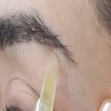 Parissa Brow Waxing Pen applied beneath the eyebrow