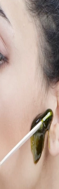 Parissa Face and Lip Hot Wax applied to facial skin