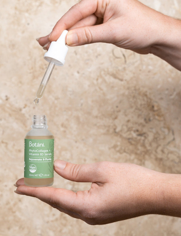Botani PhytoCollagen Vitamin B3 Serum 30ml — vitamin B3 serum dropper in hand