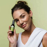 Botani Purify Facial Cleanser 100ml — model holding facial cleanser