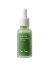 The Ere Perez Quandong Green Booster Serum 30ml is a green frosted glass bottle with a white dropper cap, featuring hyaluronic acid and vitamin C, set against a white background.