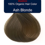 Teardrop-shaped tuft of smooth, muted brown hair beneath a navy label reading Radico 100% Organic Hair Color, Ash Blonde.