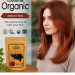 Radico Auburn Red graphic showing a woman with long, layered copper-red hair beside a brown paper hair-colour pouch, with the shade name printed on a reddish-brown brushstroke above.
