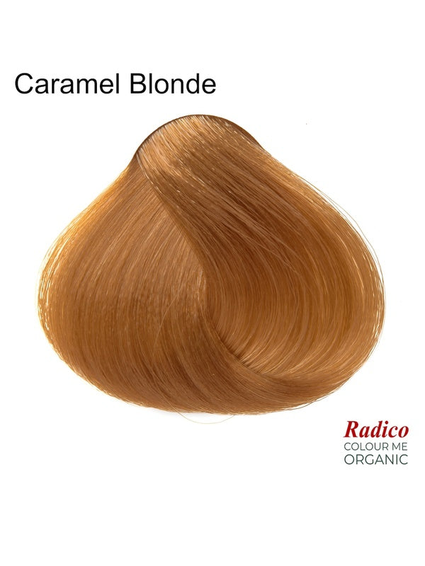 Rounded teardrop-shaped tuft of smooth, warm golden-caramel hair beneath the shade name Caramel Blonde, with the Radico Colour Me Organic logo at the lower right.