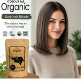 Radico Dark Ash Blonde graphic showing a woman with a smooth grey-brown bob beside a brown paper hair-colour pouch, with the shade name printed on a grey-brown brushstroke above.